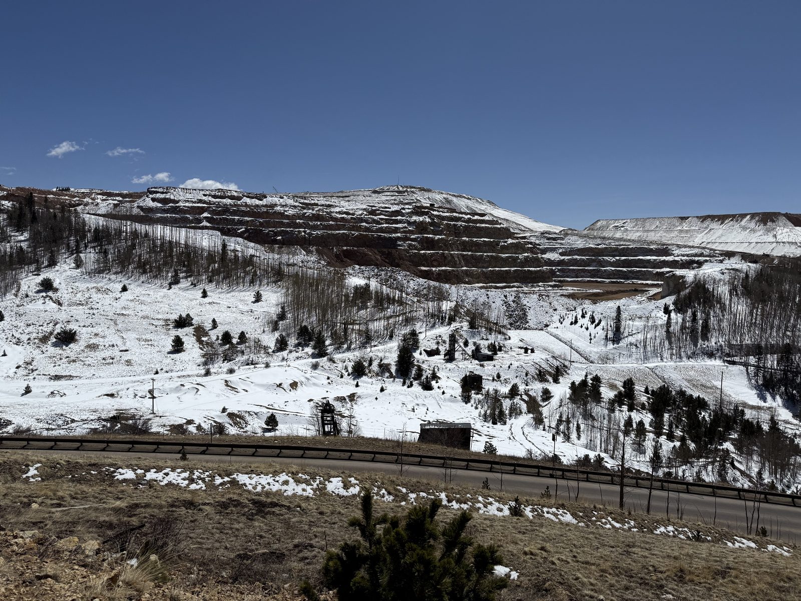 Terraced open pit mine in snow