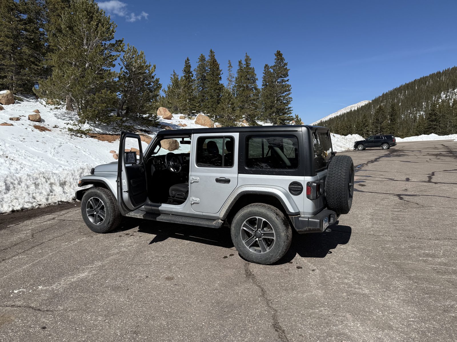 The Jeep parked at a highway pullout